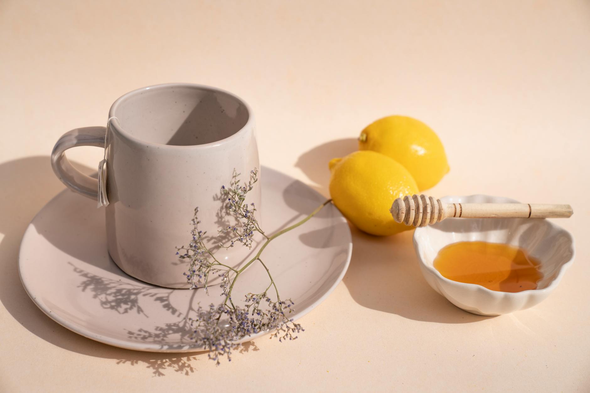 fresh lemons and honey on a bowl